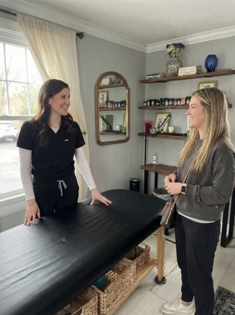 Caitlin talking to patient